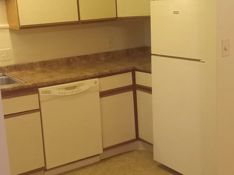 Kitchen view from dining room from different angle