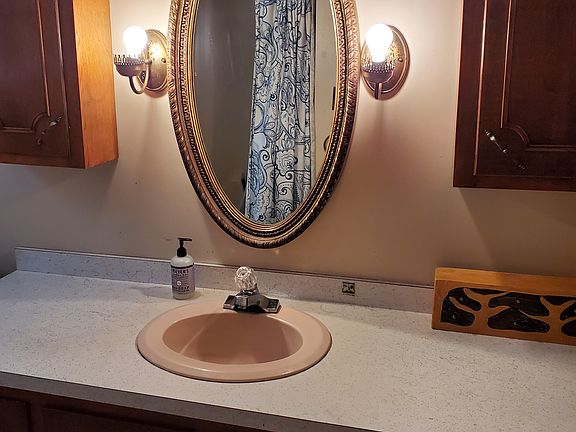 his & hers cabinet. bathroom