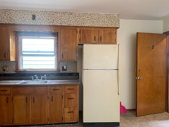 the kitchen, refrigerator not included. kitchen and living room is near the entrance to the apartment.