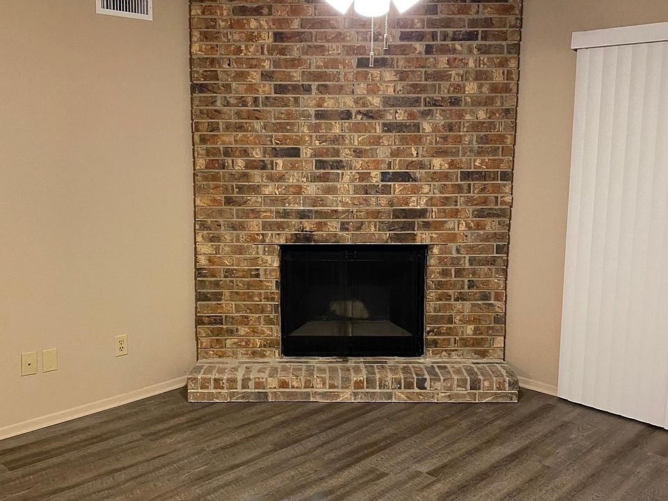 Fireplace located in the living room.