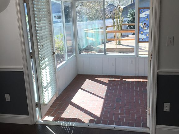 Dining rm leading into porch