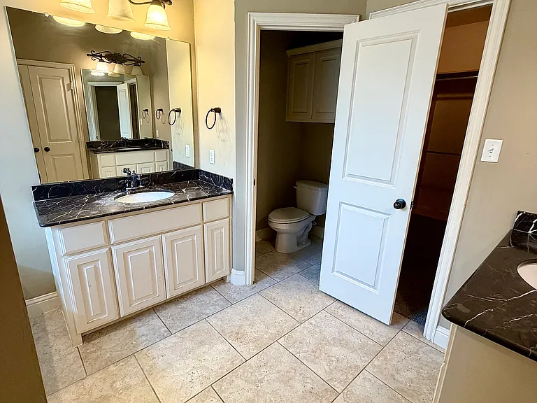 Primary bedroom connected bathroom