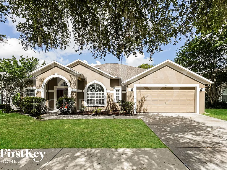 2409 Wheeler Groves Dr — Photo 1