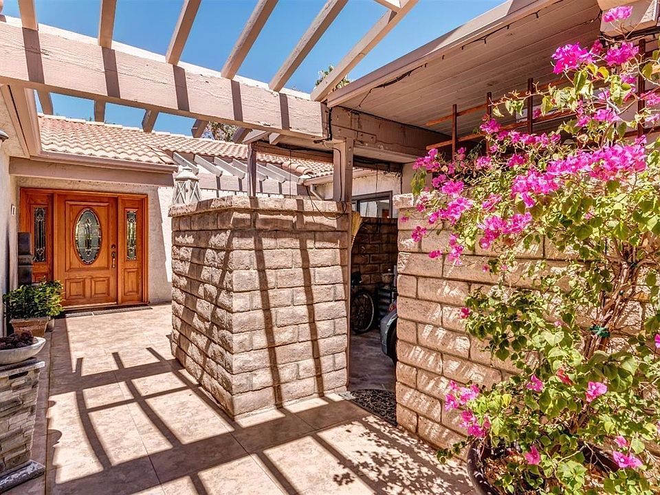 Front entry through private gate and patio