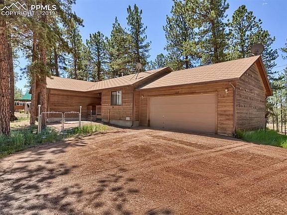 Custom Cedar Home on a half-acre treed lot in Colorado Mountain Estates, Florissant Colorado 80816