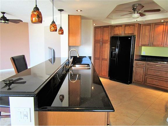 5th image of 5950 Pelican Bay Plz S APT 404