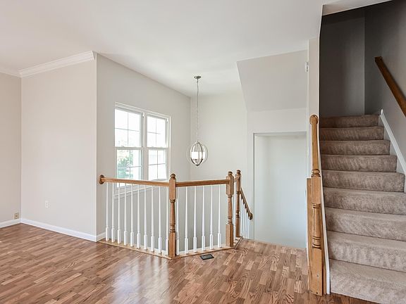 Entry into living room and steps to the third floor