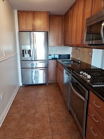 1st image of 9655 Woods Dr Unit 1609
