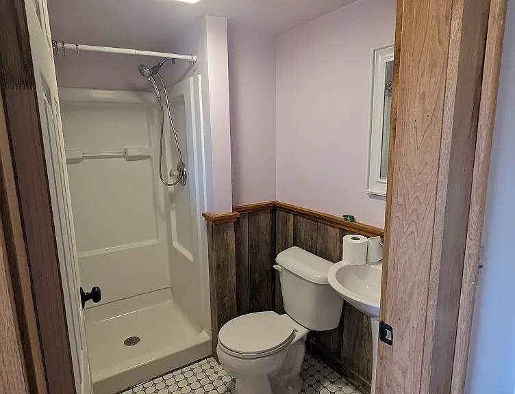 Bathroom located in the bedroom.