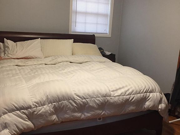 Large master bedroom that easily accommodates a king sized bed