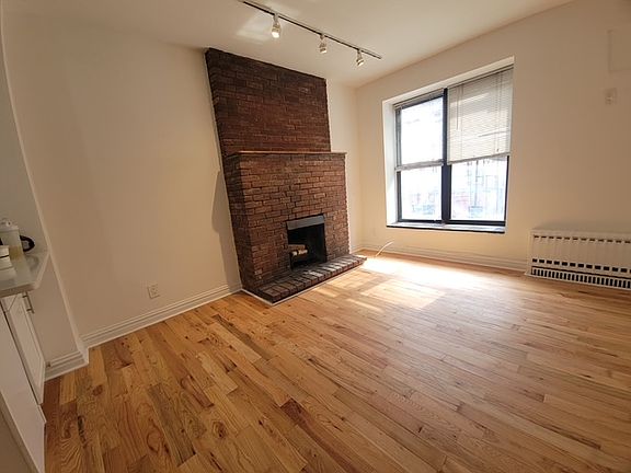 2nd image of 255 E 10th St APT 2A