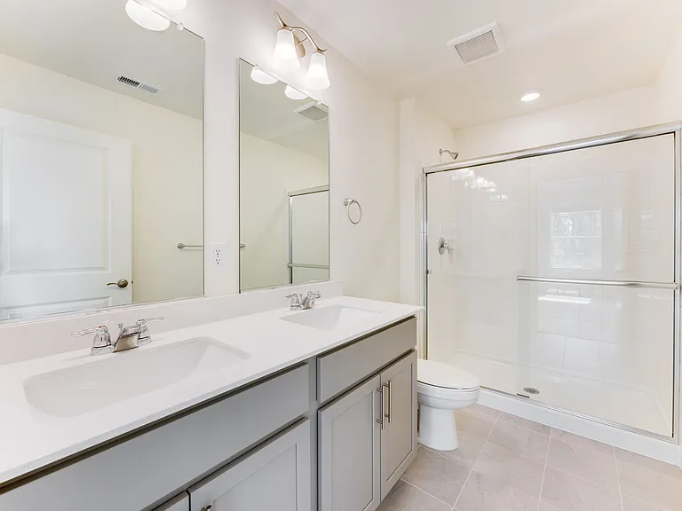 Primary on suite bath with double vanities