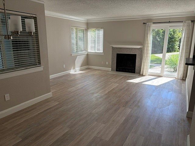 Living room/dining area with two separate entrances