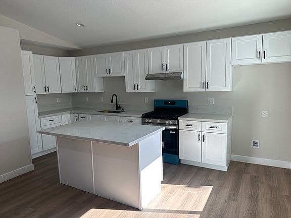 Kitchen with new stove.