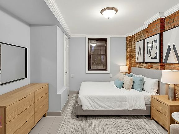 2nd image of 118 E 7th St APT 1W