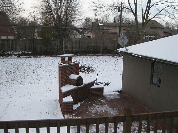 Back yard brick grill
						:
						Spacious backyard and deck