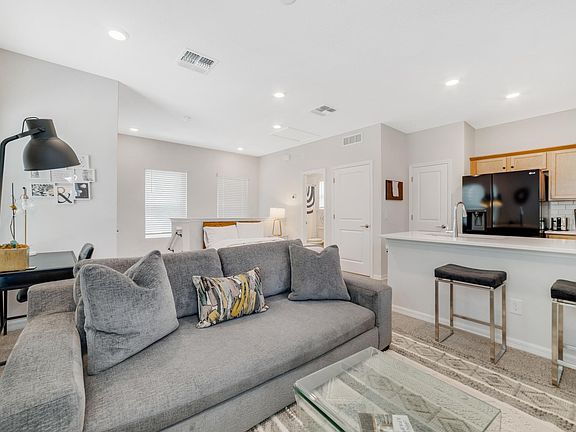 Living room space, office area, fully equipped kitchen, bedroom area, full bathroom and laundry closet with full size washer/dryer.