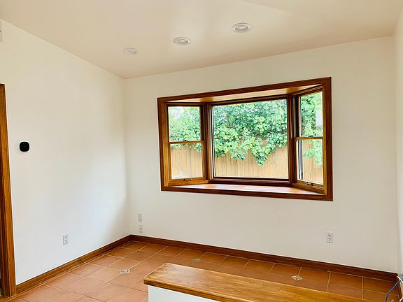 Bay window in living room facing back yard.