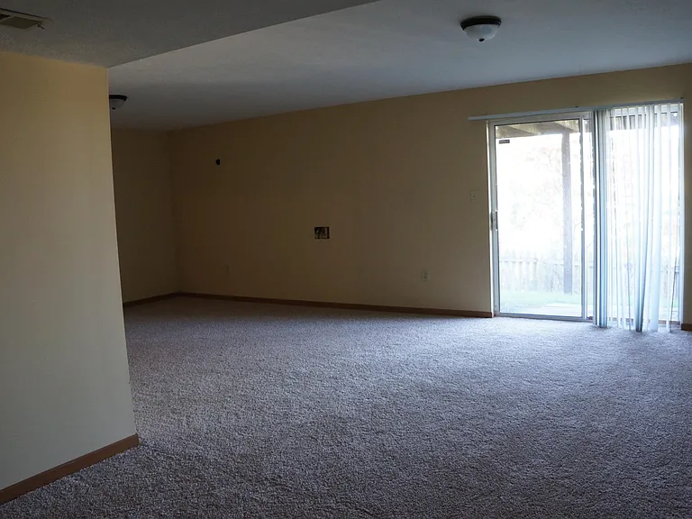 Large Finished basement with walkout sliding door. Includes a full bath downstairs. This is a great additional space if you have young children or just need some extra room!