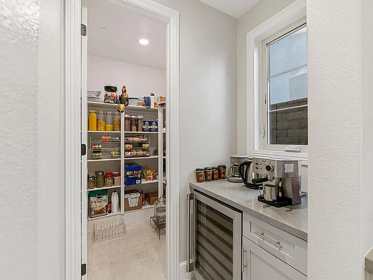 Giant walk-in pantry! Custom coffee bar and Wine Refrigerator!