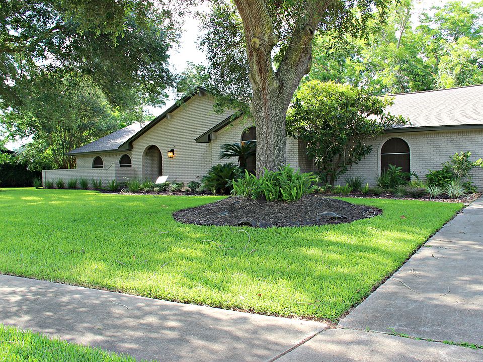 Large yard with mature trees
