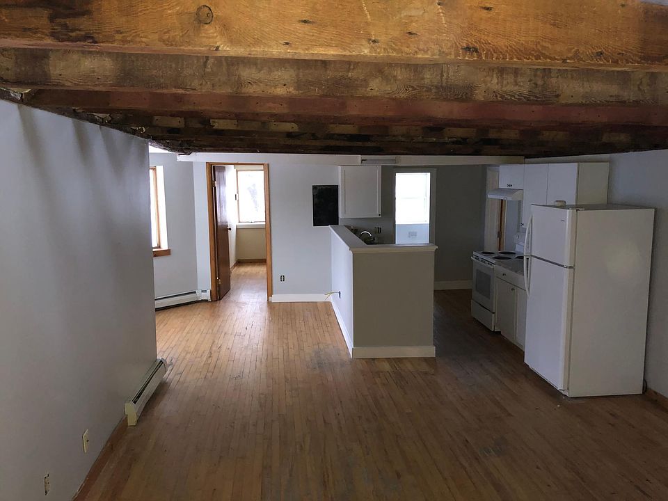 Living room looking into kitchen