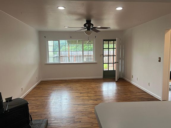 Kitchen thru living room, yard.