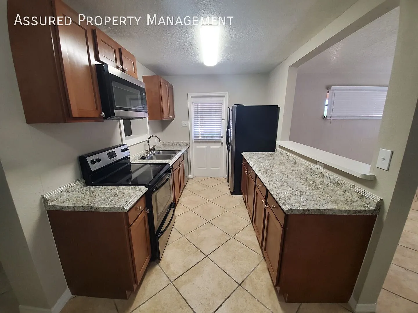 Updated 3-Bedroom 2-Bathroom Home with Fenced Backyard & Large Covered Porch! — Photo 3