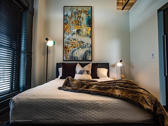 Bedroom with sliding barn door