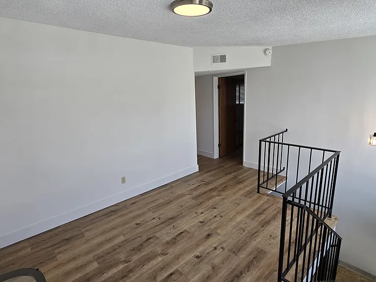 Top of stairs bonus room can be used as a library, TV room, office space, etc.