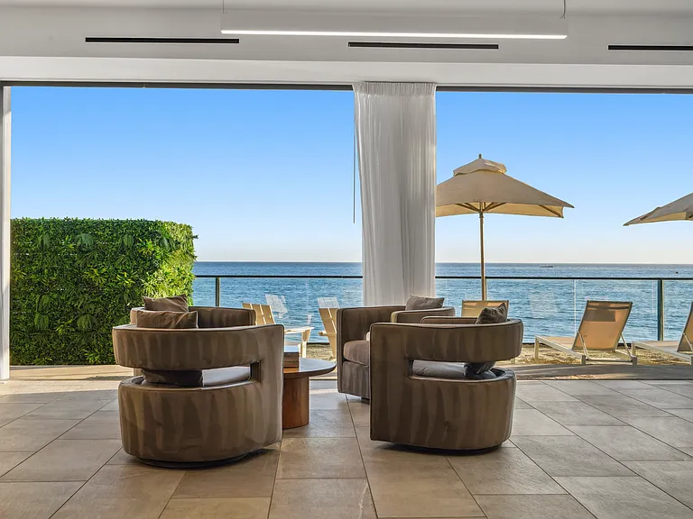 Sink into plush sofas, unwind, and let the ocean views inspire your stay.