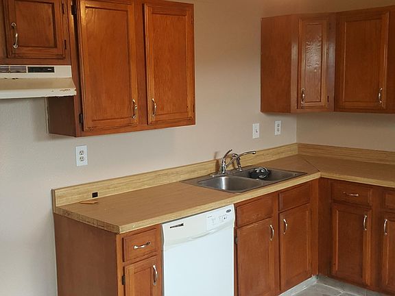 Large eat in kitchen with plenty of storage. New electric stove and vent hood have been installed. Ready for your family now.