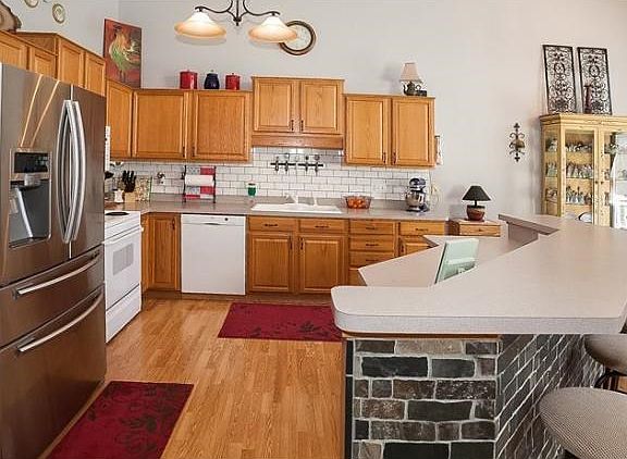 Open floor plan with soaring ceilings