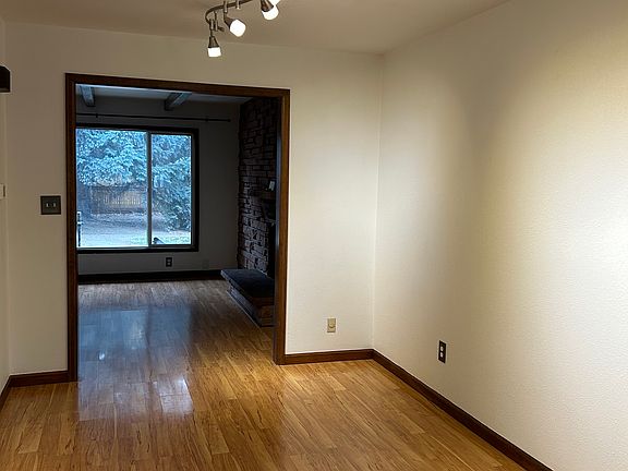 Dining room. To the left is the half bath