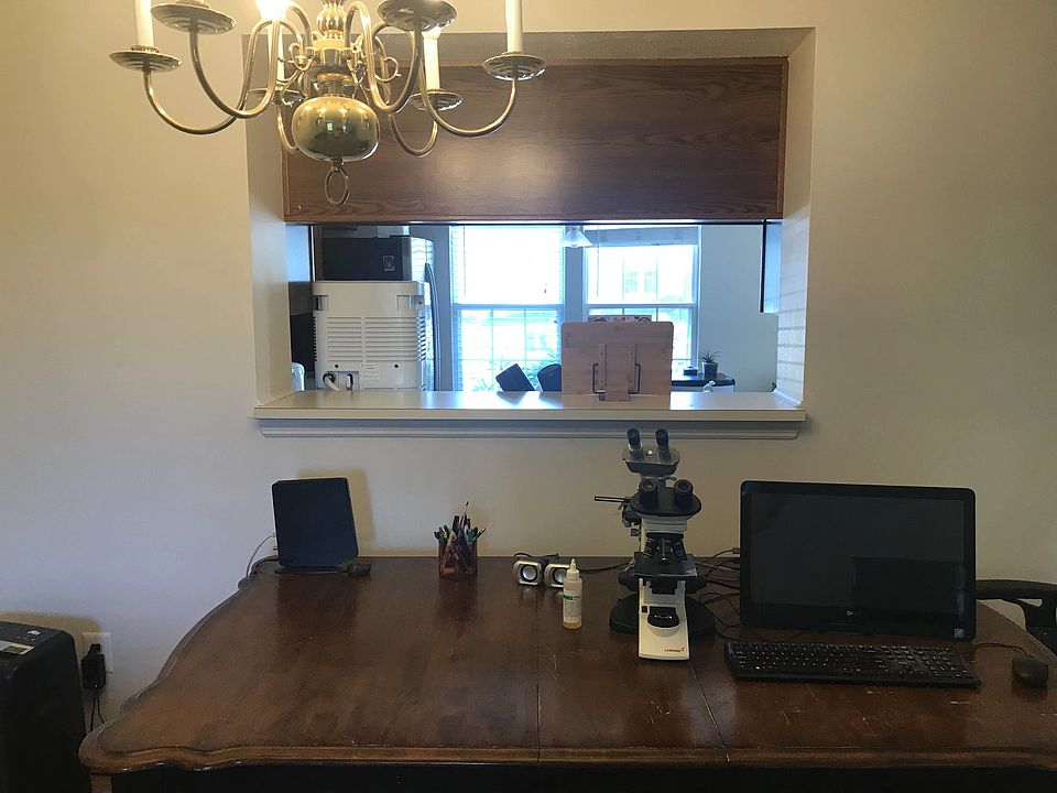 Dining/living room has a opening view to the kitchen.