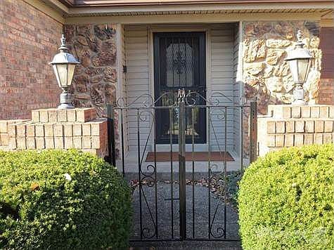 <em><b>Beautiful Curb Appeal With Court Yard & All Brick Exterior!