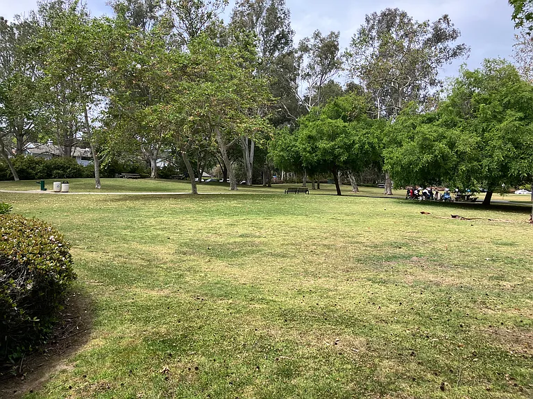 La Jolla park steps away with picnic tables and benches to relax