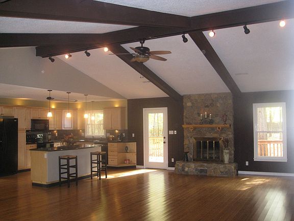 Great room's soaring ceilings emphasizes spaciousness.