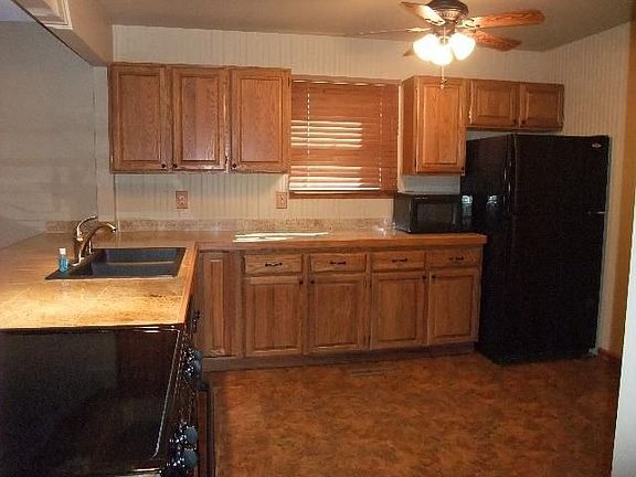 Updated eat-in kitchen w/large pantry.  Opens up to spacious family room.
