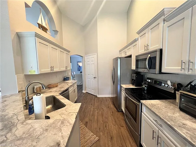 25240 Pelican Creek Cir #202 — Photo 7