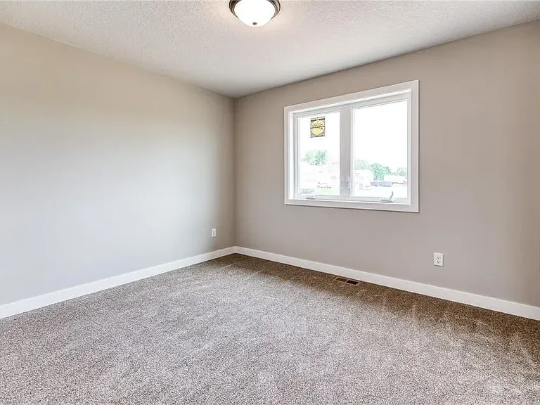 Four Upper Level Bedrooms With Back Yard View.