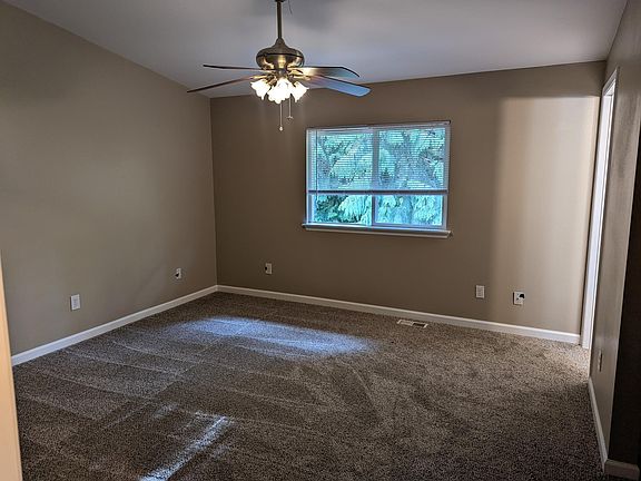 Master Bedroom. Walk in closet (to left) and sliding door closet (to right). and full bath (far right)