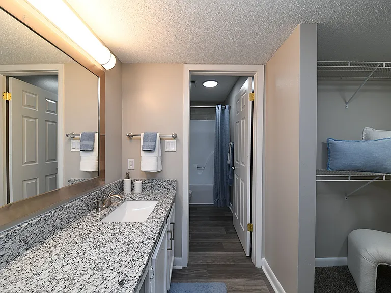 Bright bathroom with granite counters