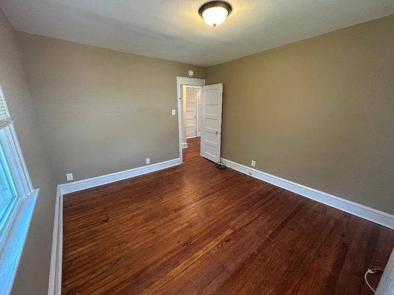 Primary Bdrm, Hardwood Flrs, Freshly Painted.