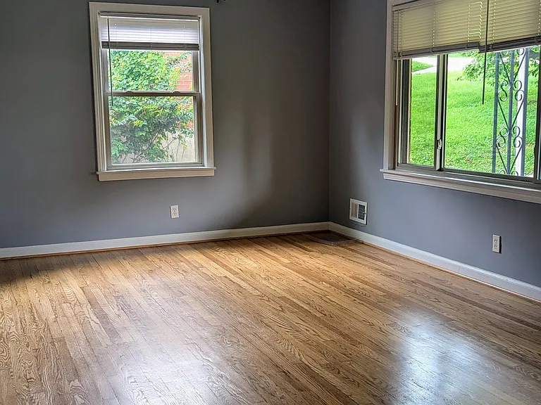The living room and all the rooms on the main level feature hardwood floors.