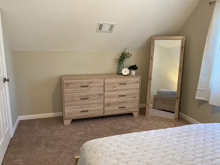 Bedroom 1. home does not come furnished. furnishing is for visual reference only.