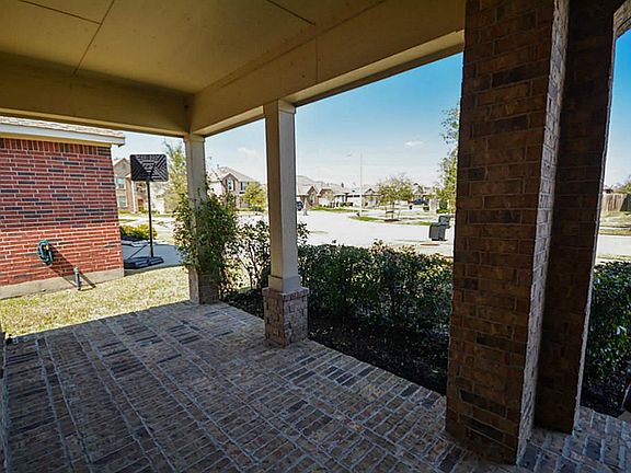 Covered front porch, perfect place to enjoy your morning cup of coffee