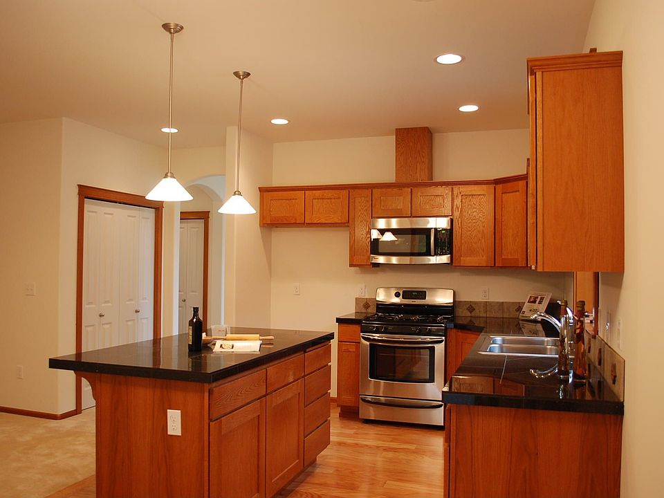 Kitchen with stainless appliances and granite counter tops