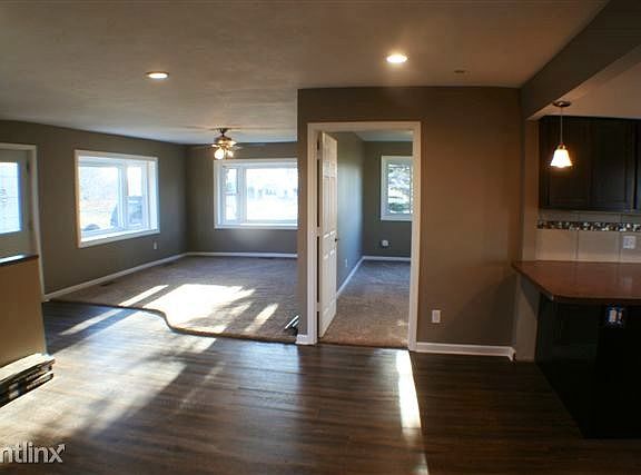 Living room with 2 bay windows