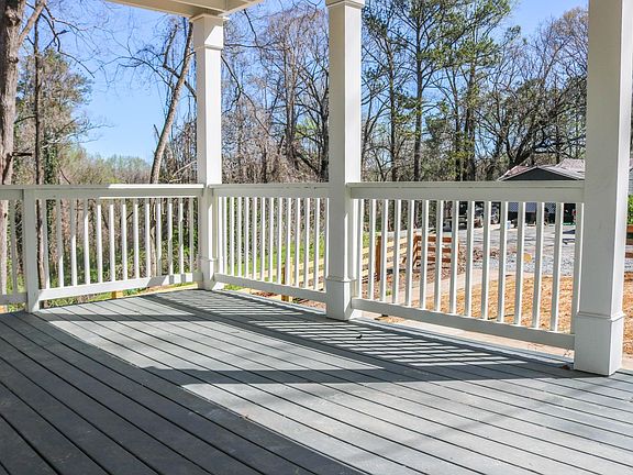 Rocking chair front porch overlooking a quiet street